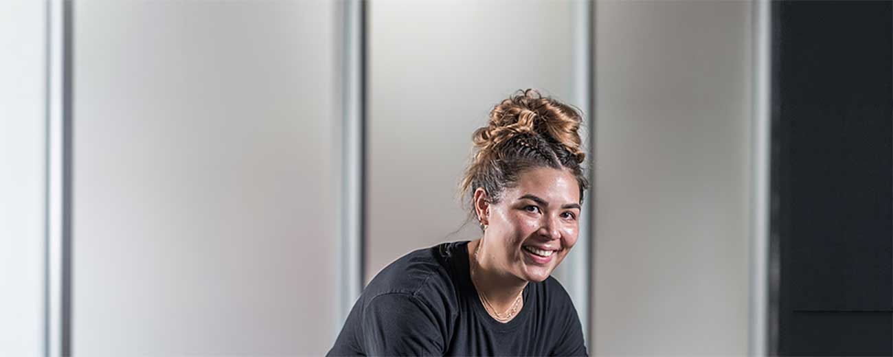Headshot of a girl smiling as she exercises
